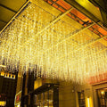 LED Icicle Christmas Lights, 16.4FT 216 LEDs Fairy Extendable Curtain 8 Modes Dangling Twinkle Novelty Hanging String Lights for Ceiling Garden Party Decorations, Warm White 5M